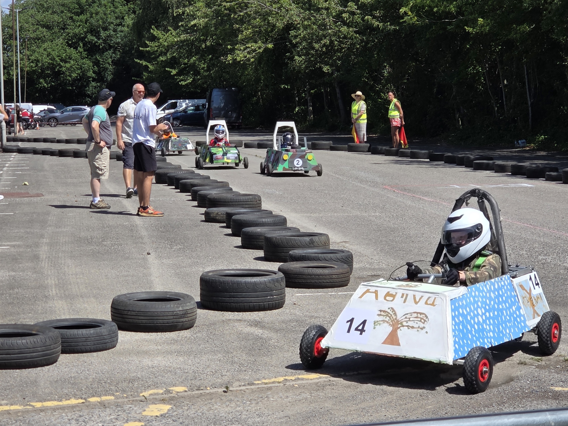 A photo of the go kart track with go karts racing
